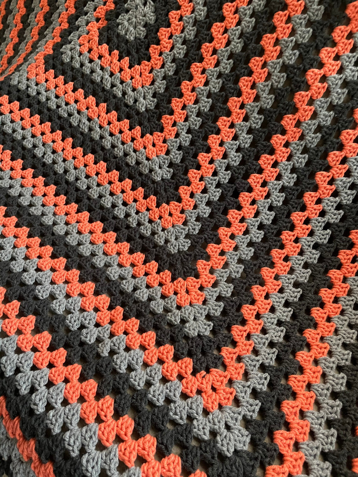 Gray and orange Blanket